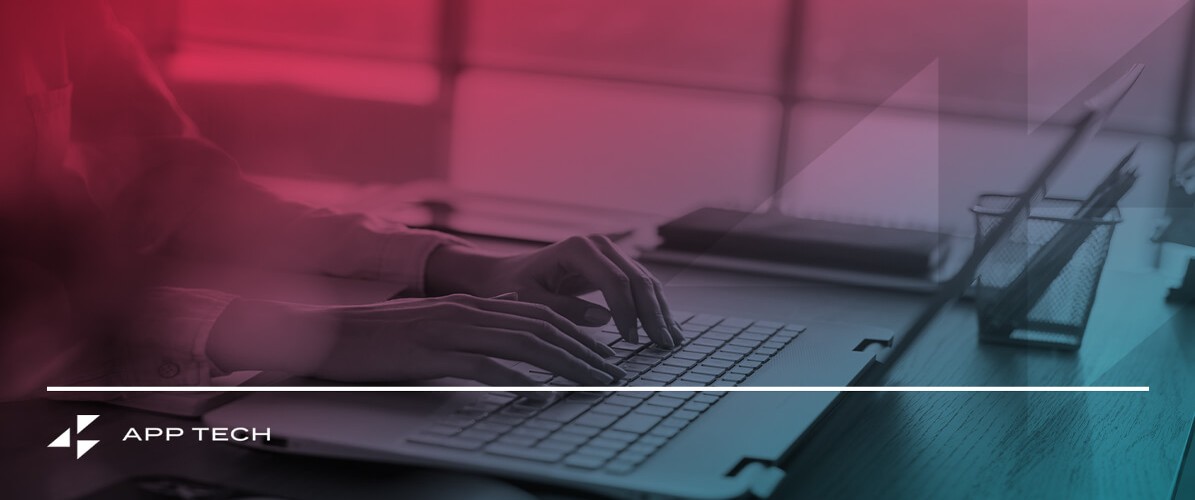 a person typing on a laptop with app tech written on the bottom